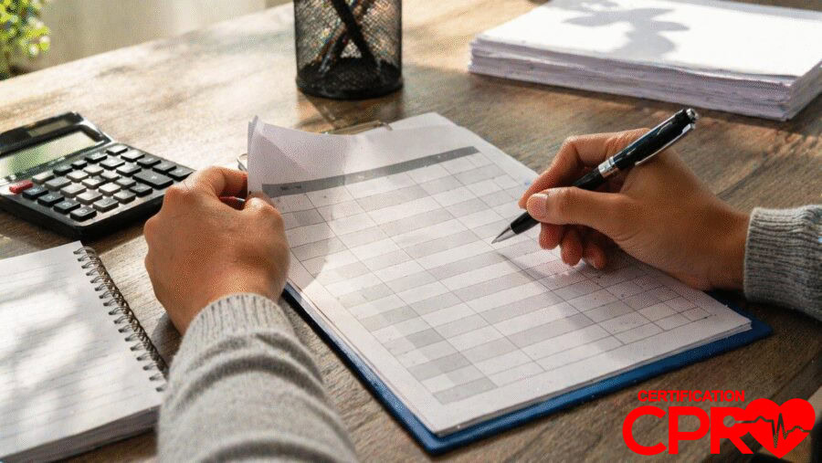 Person filling out a form for CPR certification in Fort Worth, Texas.